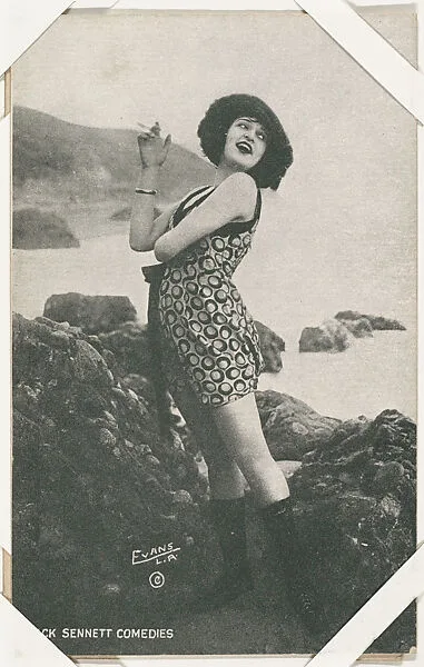 Bathing beauty in costume holding cigarette from Mack Sennett Comedies Arcade series (W423) — Unknown