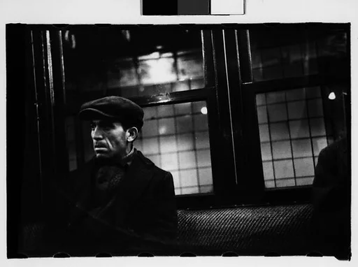 [Three 35mm Film Frames: Subway Passengers, New York City: Man in Cap, Woman in Hat and Gloves]