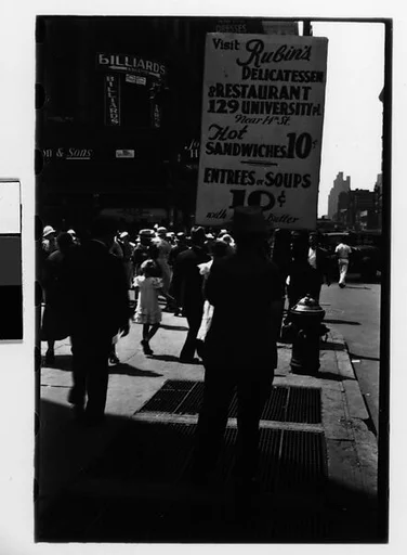 [Two 35mm Film Frames: Man with Sandwich Board Advertisement, Fourteenth Street, New York City]