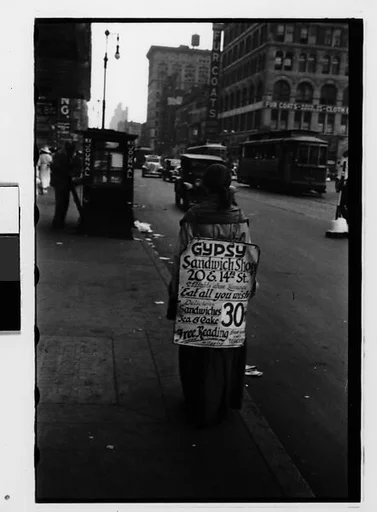 [Two 35mm Film Frames: Woman Wearing Sandwich Board Advertisement for Gypsy Sandwich Shop on Fourteenth Street, and Woman Before Shoe Store Window Display on Street, New York City]