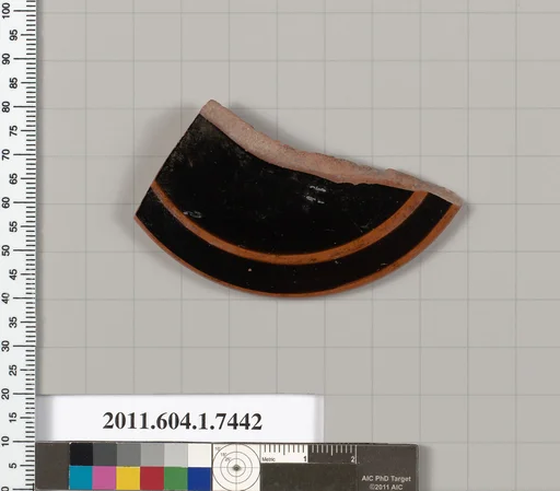 Terracotta fragment of a kylix (drinking cup)