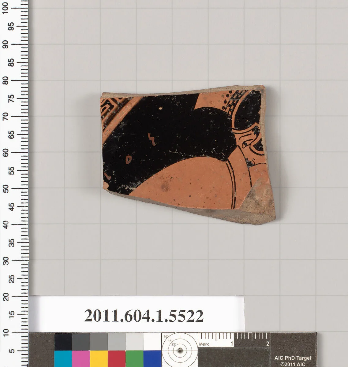 Terracotta fragment of a kylix (drinking cup) — Onesimos