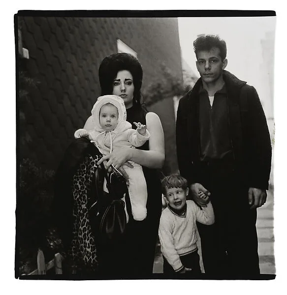 A young Brooklyn family going for a Sunday outing, N.Y.C. — Diane Arbus