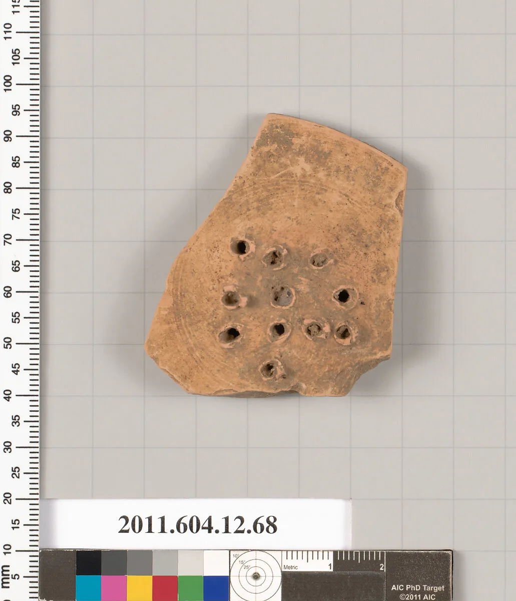 Terracotta fragment of a guttus (flask with handle and spout) — Unknown