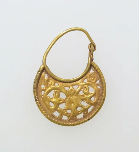 Gold lunate earring with scrolls