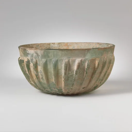 Glass hemispherical ribbed bowl