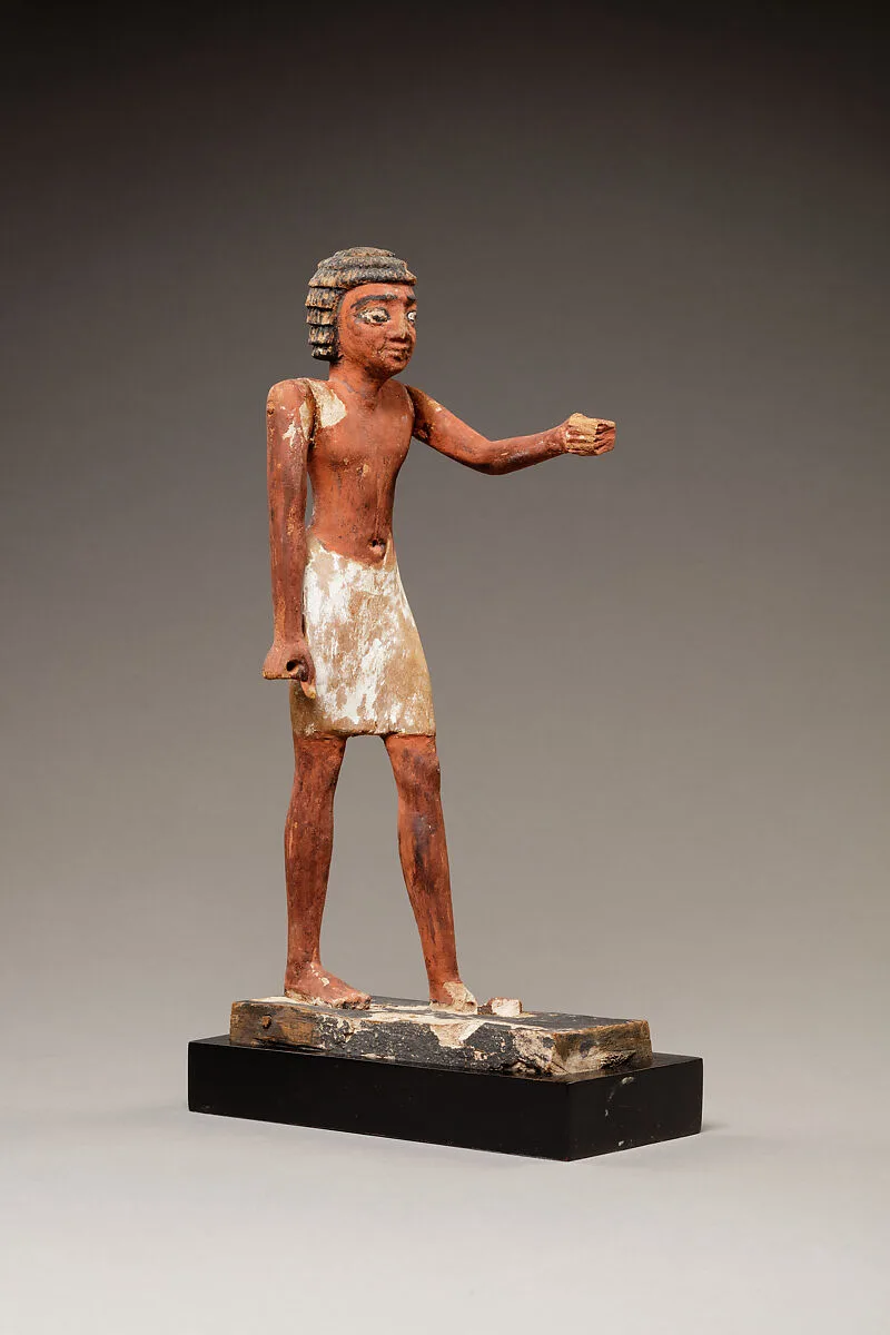 Statuette of a Striding Man in a Kilt — Unknown