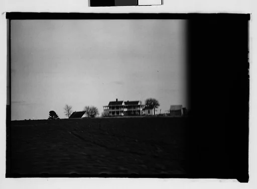 [Plantation House in Field, From Moving Automobile, Macon, Georgia]