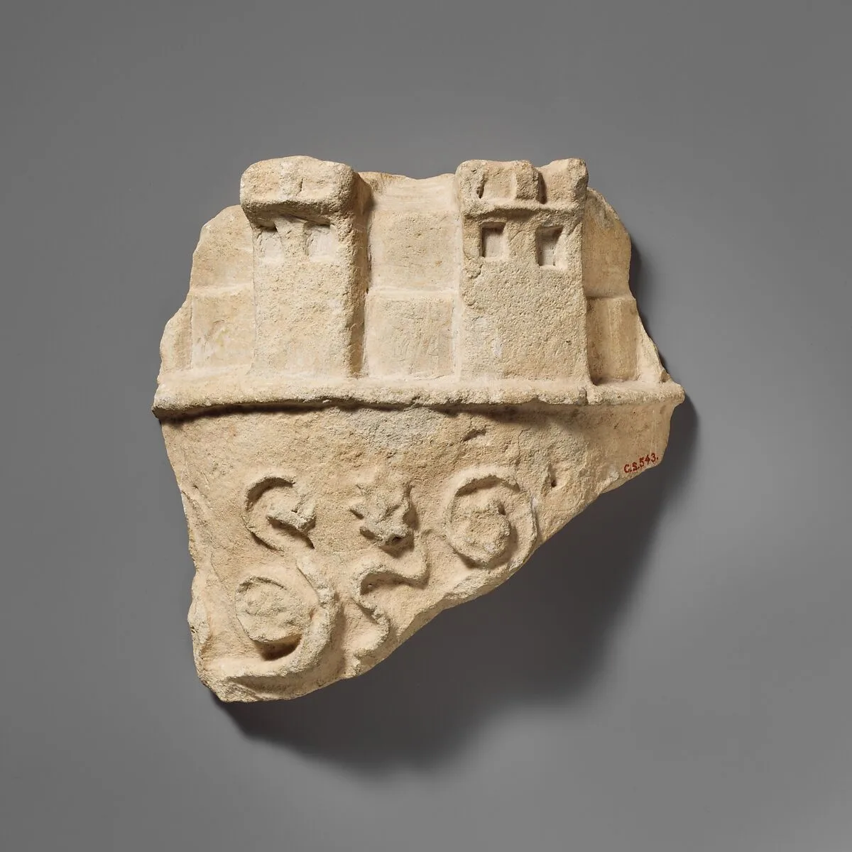 Fragment of a limestone crown belonging to a statue of the Great Goddess — Unknown