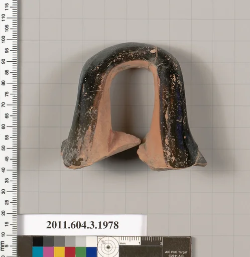 Terracotta fragment of a kylix (drinking cup)