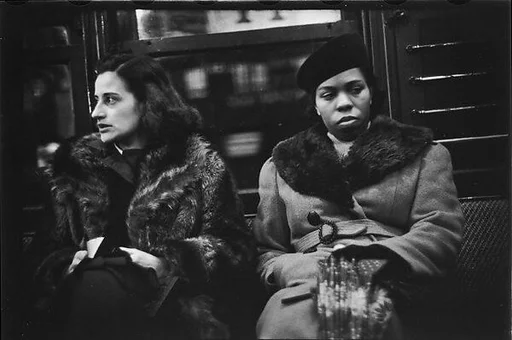 [Five 35mm Film Frames: Subway Passengers, New York City: Women in Fur Collars, Woman with Package on Lap]