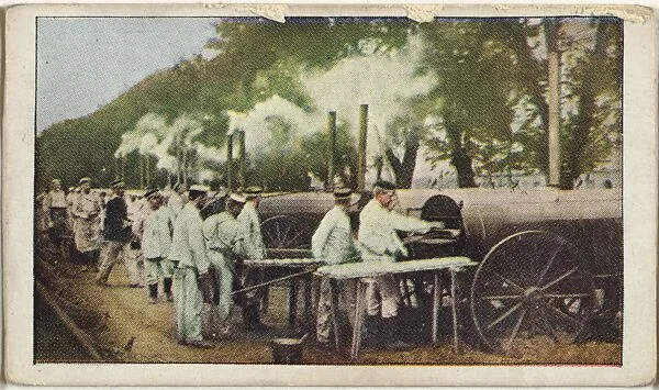 Card No. 22, Baking 16,000 Loaves of Bread for Daily Consumption in Germany Army, from the World War I Scenes series (T121) issued by Sweet Caporal Cigarettes — Underwood & Underwood|American Tobacco Company