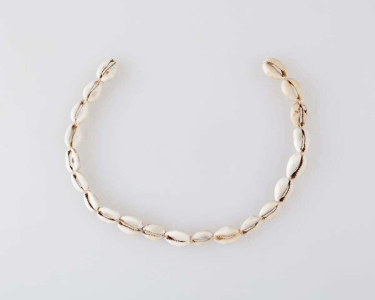 String of cowrie shells — Unknown