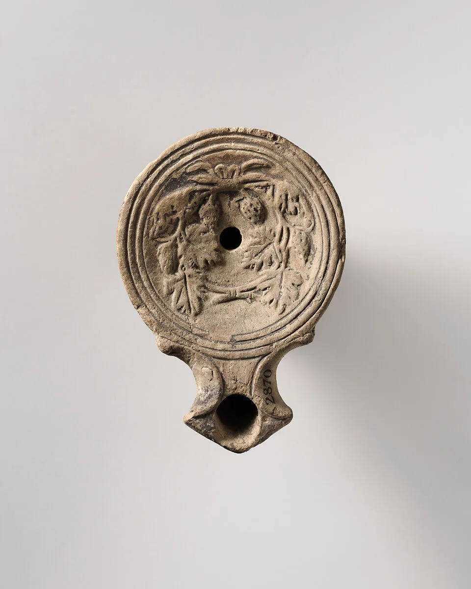 Terracotta oil lamp — Unknown