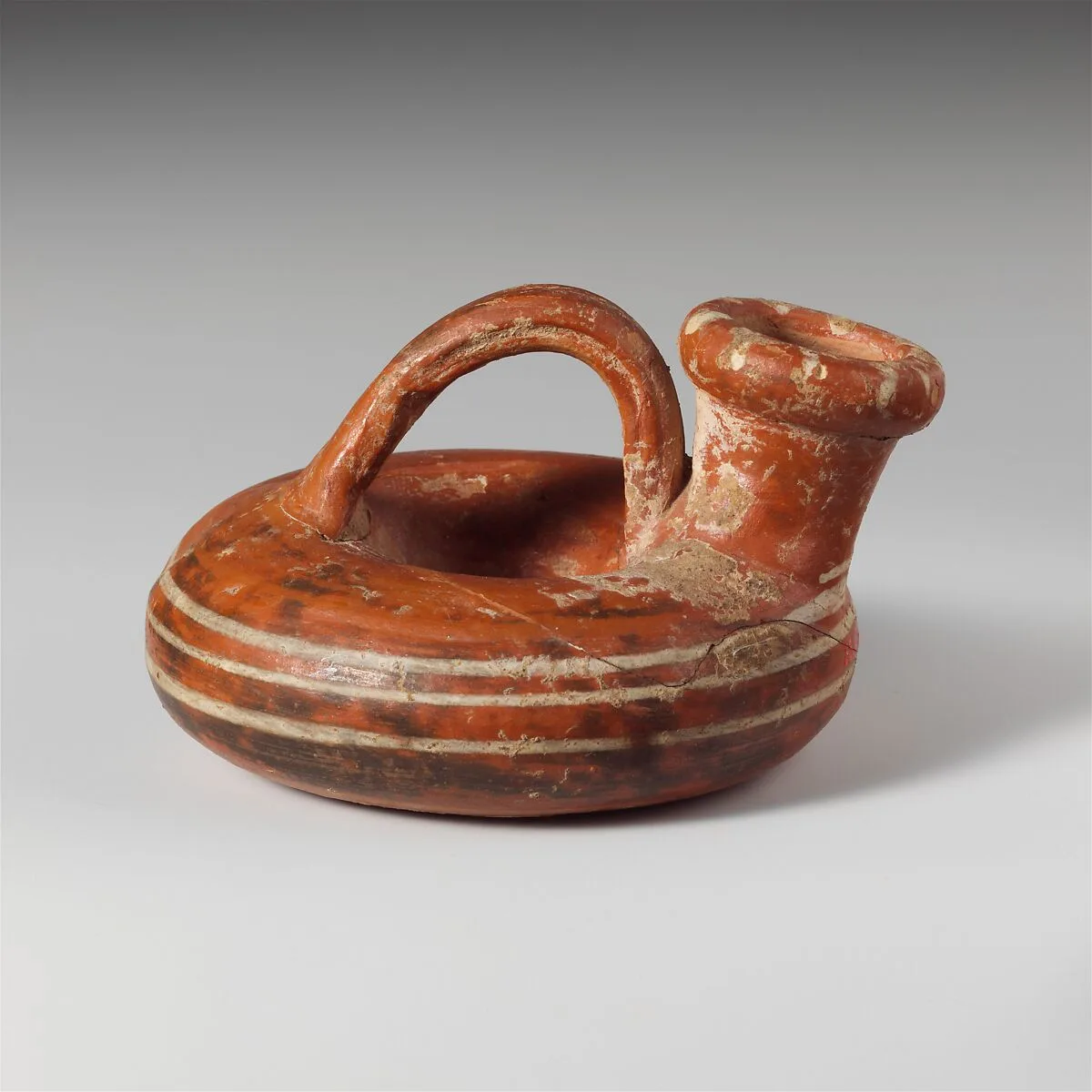 Terracotta ring askos (flask with a spout and handle over the top) — Unknown