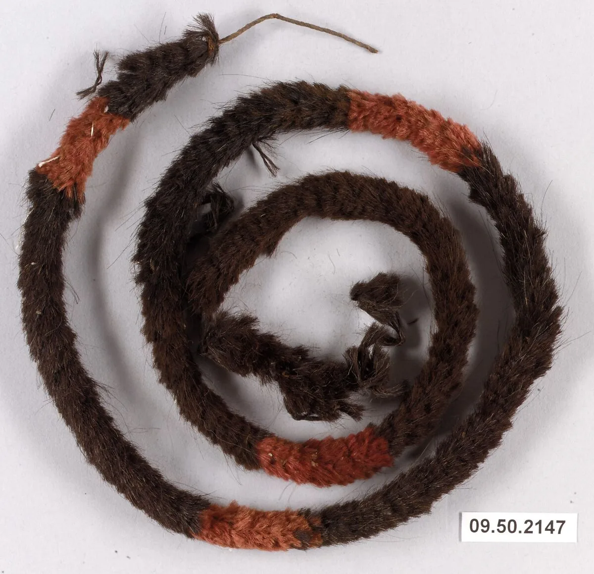 Braided and Knotted Head Cord or Fillet — Unknown