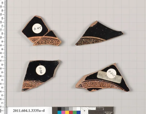 Terracotta fragments of kylikes (drinking cups)