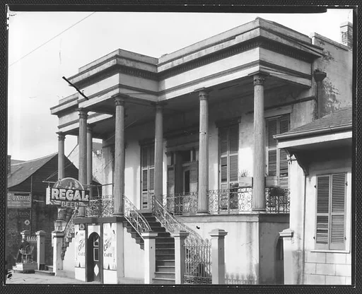 [Greek Revival Building with Ground Floor Entrance to The Cadillac Cafe, New Orleans, Louisiana]