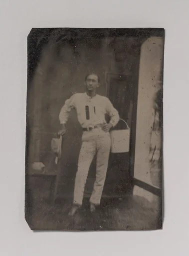 [Man with a Bucket on his Arm]