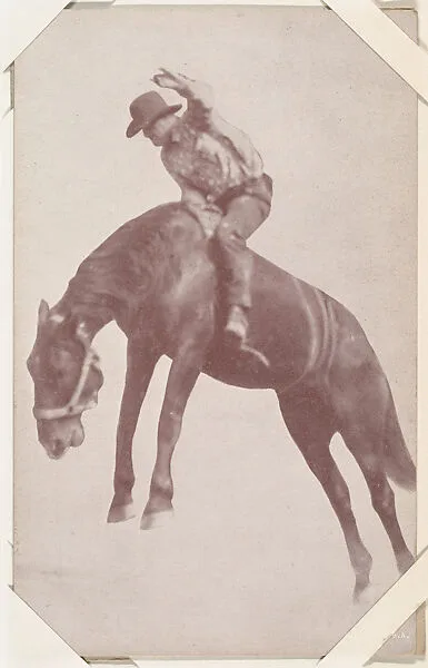 Cowboy riding bucking bronco from Indians and Western Historical Scenes series (W417) — Unknown