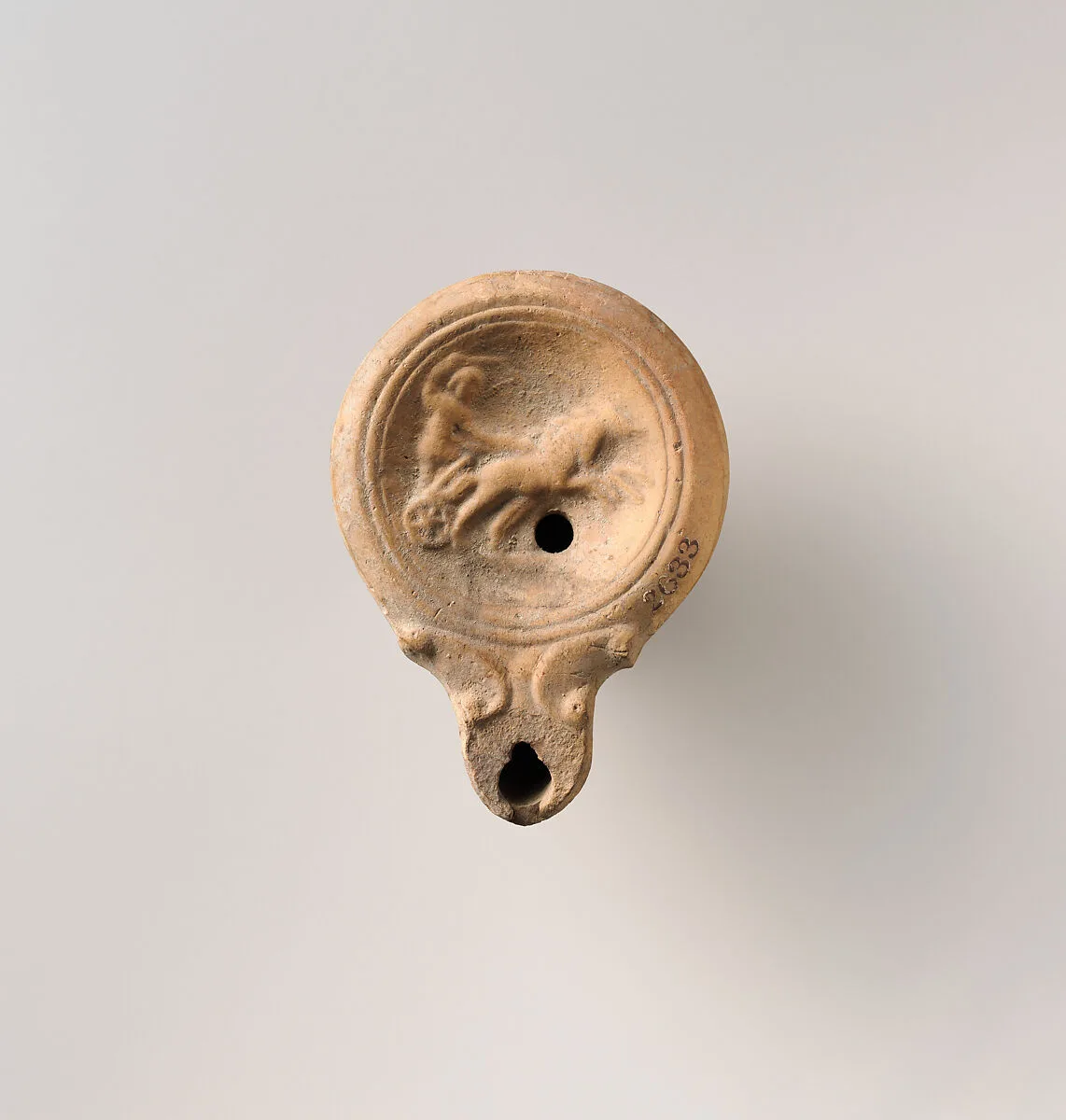 Terracotta oil lamp — Unknown