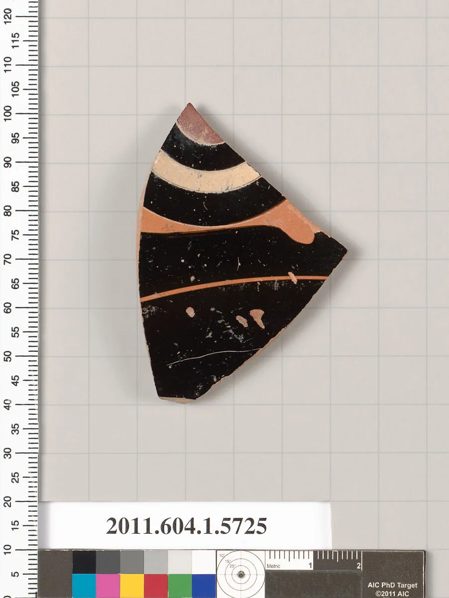 Terracotta fragment of a kylix: eye-cup (drinking cup) — Oltos