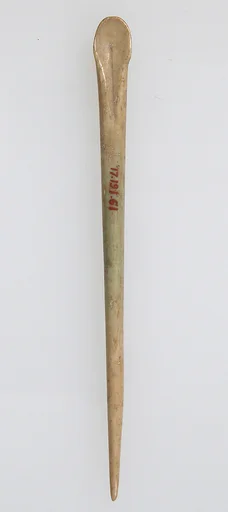 Toilet Implement in the Shape of a Pin
