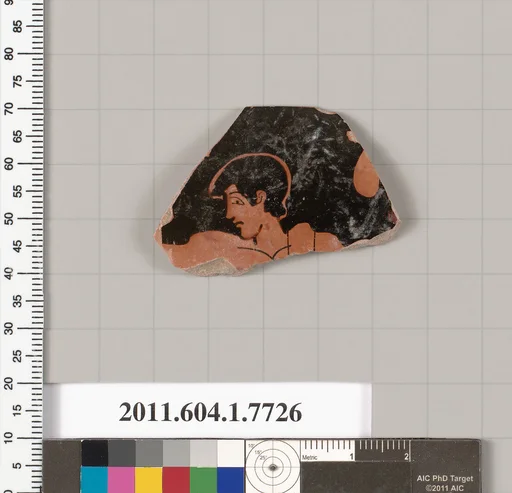 Terracotta rim fragment of a kylix (drinking cup)