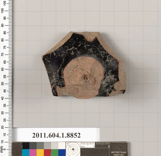 Terracotta fragment of a kylix (drinking cup)