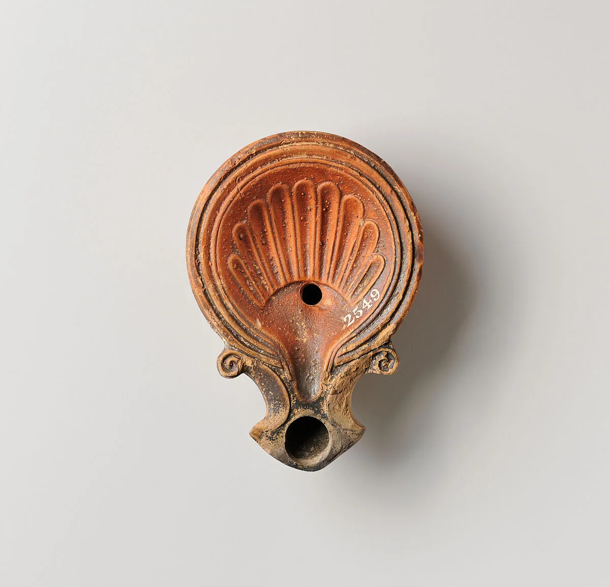Terracotta oil lamp — Unknown