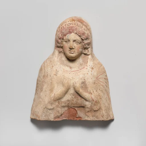 Terracotta relief bust of a woman