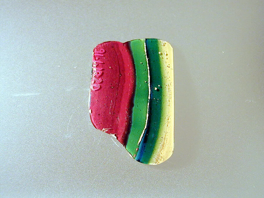 Glass striped mosaic bowl fragment — Unknown