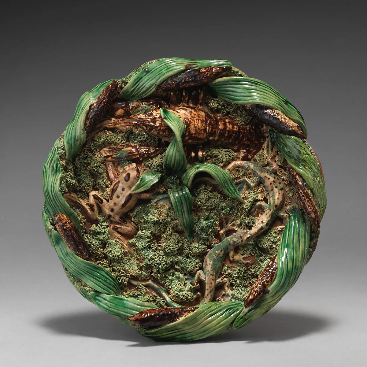 Round dish with cattail border — Emile Gambut
