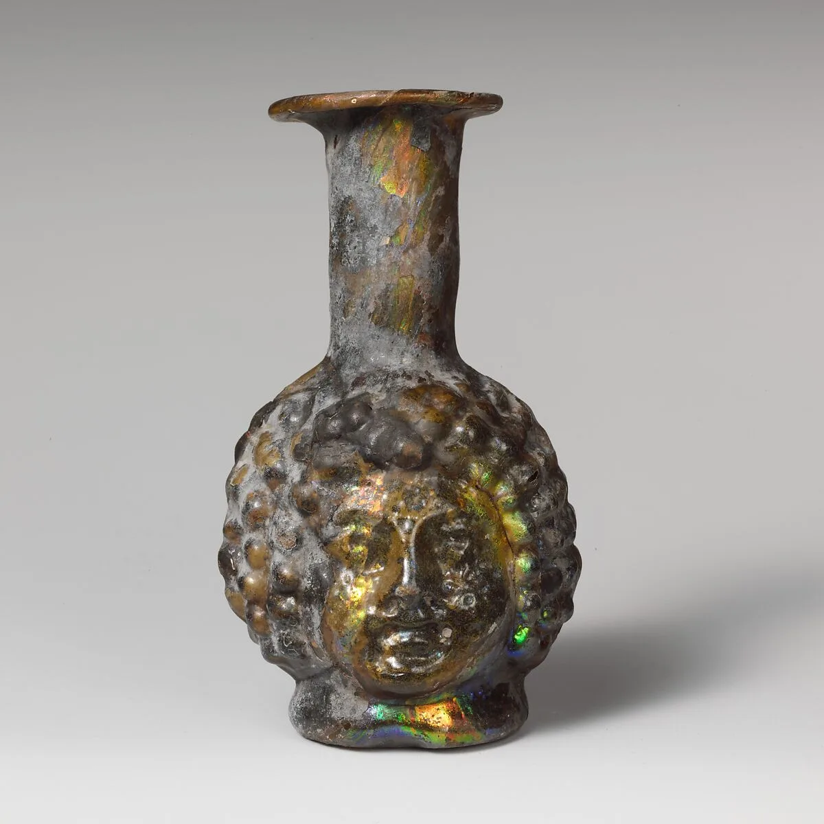 Glass double head-shaped bottle — Unknown
