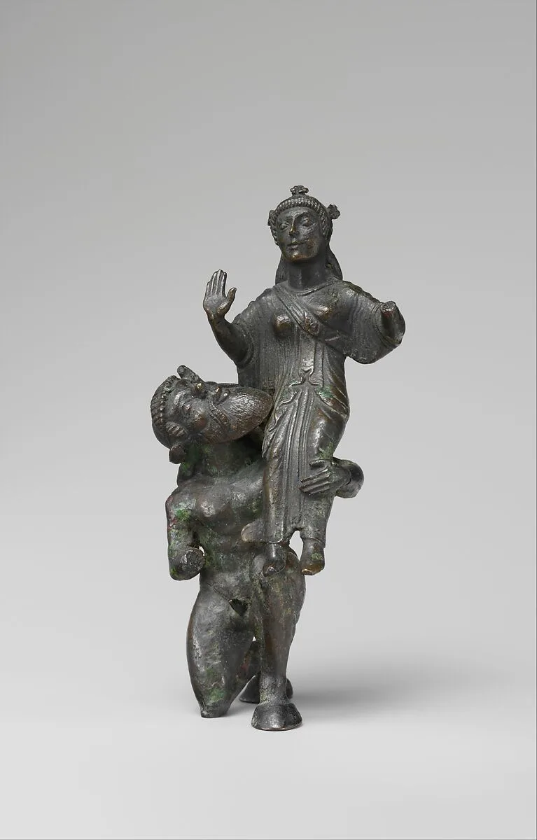 Bronze statuette of a satyr and maenad — Unknown