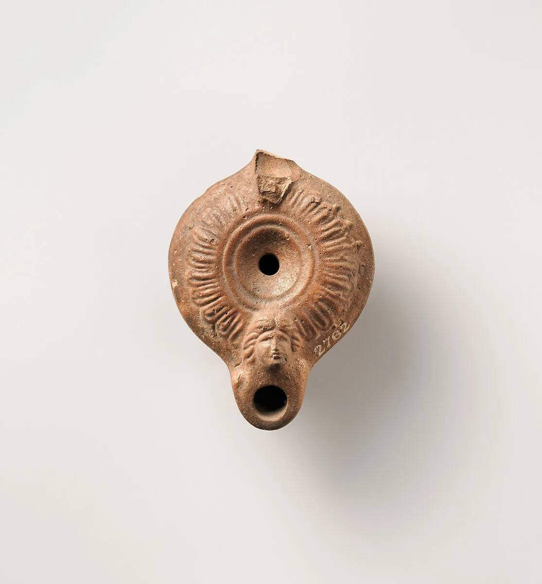 Terracotta oil lamp — Unknown