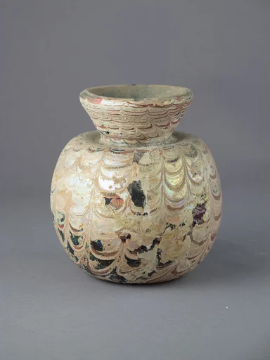 Glass jar with marvered trails