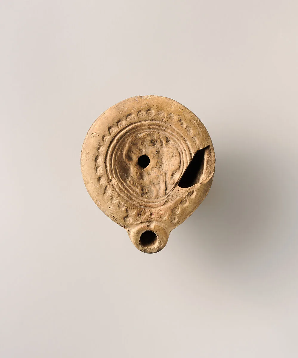 Terracotta oil lamp — Unknown
