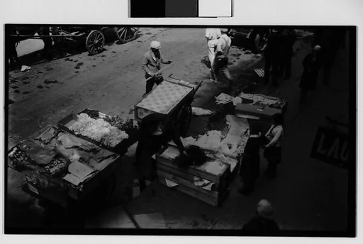 [Workers Loading Flower Carts, From Above, New York City]