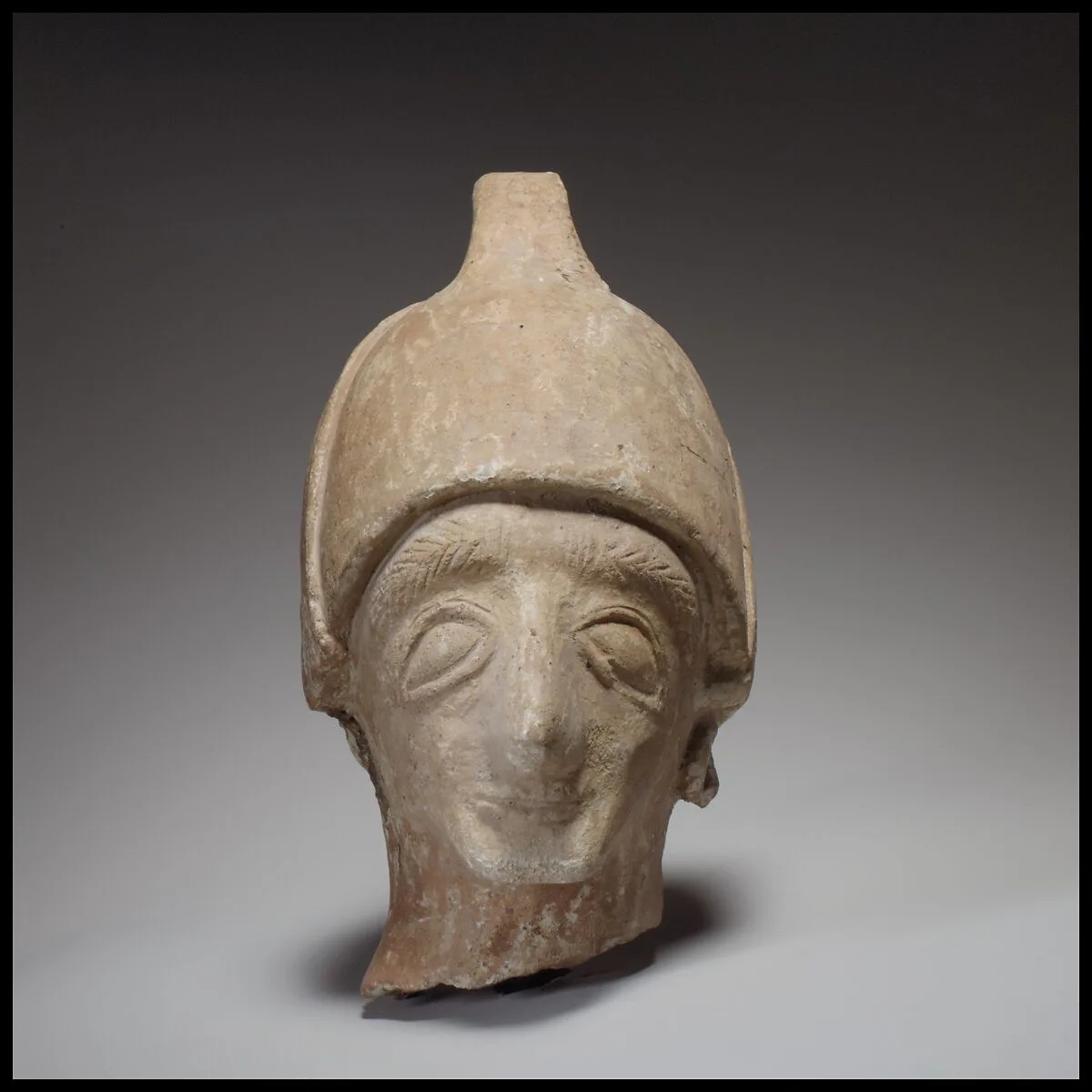 Male head wearing a helmet — Unknown