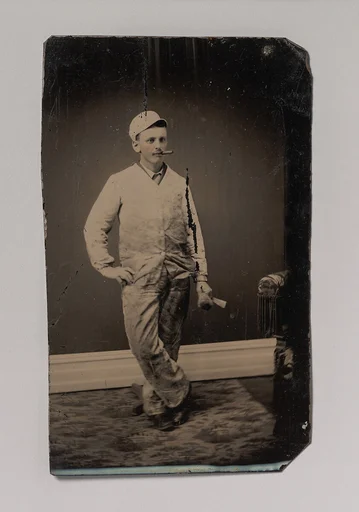 [Painter, Smoking a Cigar, Holding a Brush and Scraper]