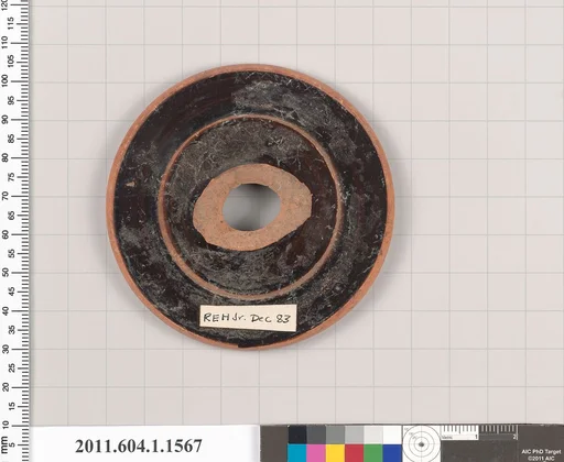 Terracotta fragment of a kylix (drinking cup)