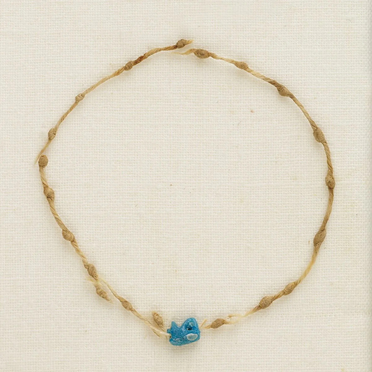 Bracelet with knots and wedjat eye — Unknown