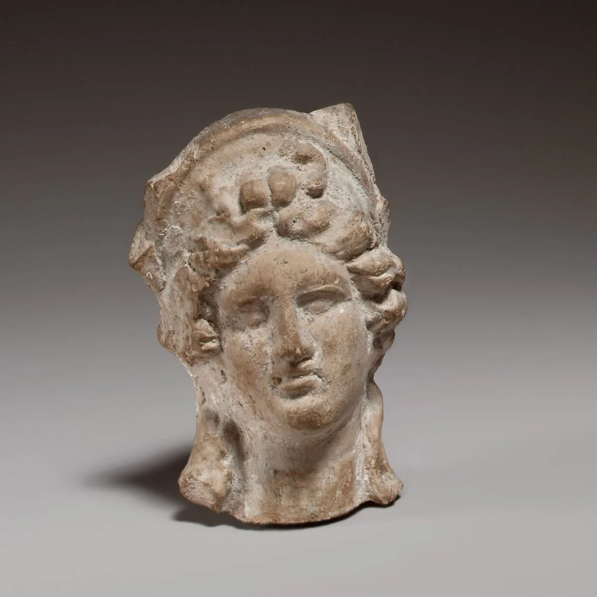 Female head — Unknown