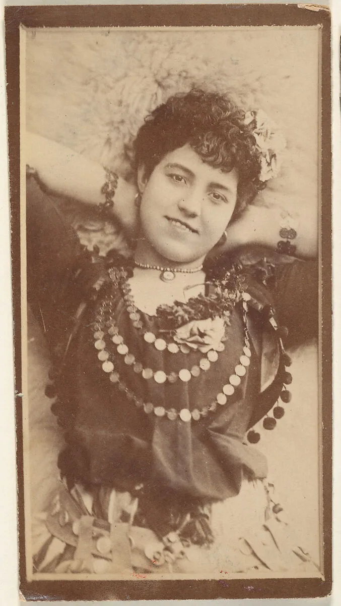 Actress on back, viewed from above, from the Actresses series (N668) — Unknown