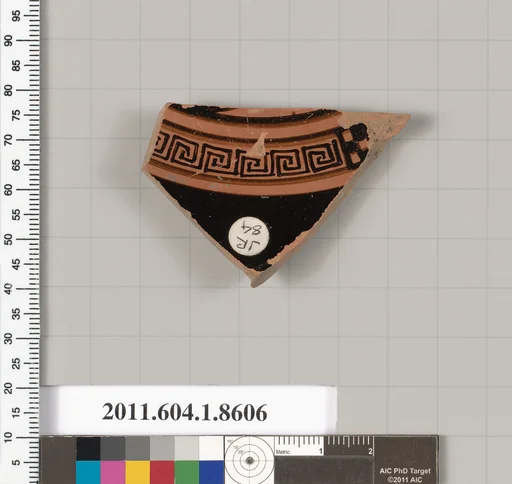 Terracotta fragment of a stemless kylix (drinking cup)