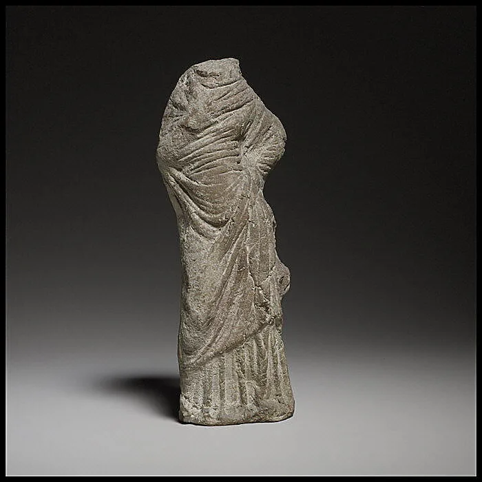 Terracotta statuette of a woman — Unknown