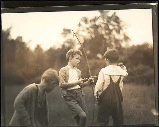 [Blair Fuller Holding Bow and Arrow, Cornish, New Hampshire]