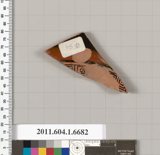 Terracotta fragment of a kylix (drinking cup)