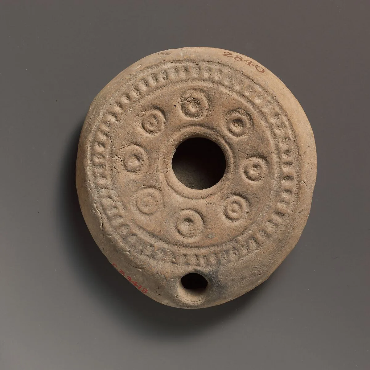 Terracotta oil lamp — Unknown